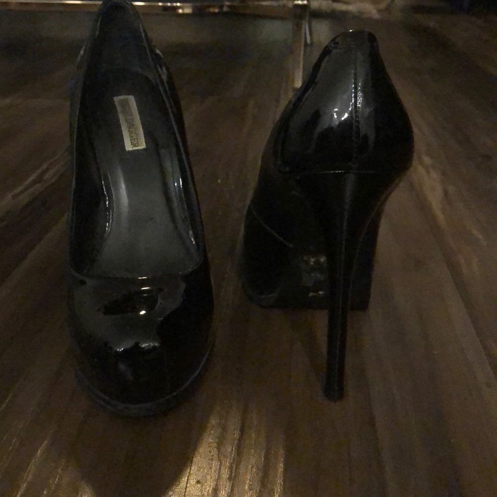 Kelsi Dagger black patent leather sky high heels.